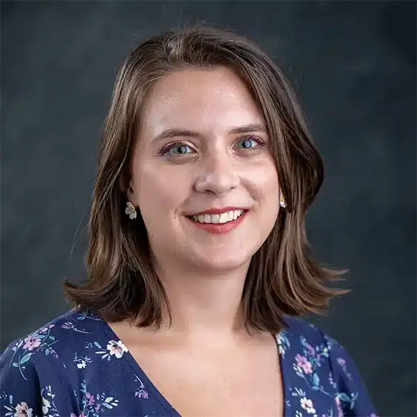 headshot photo of Maggie Warren