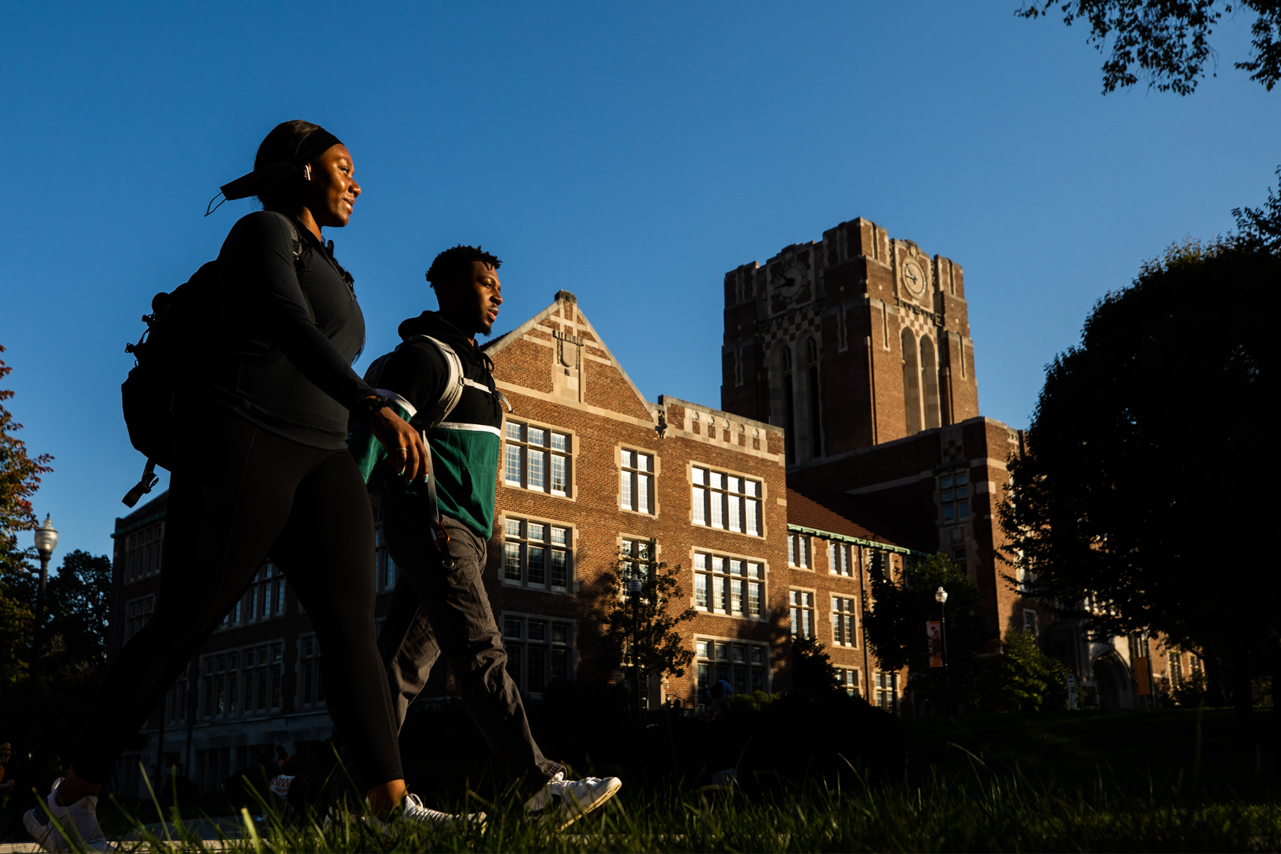 Students walk to class on the Hill with Ayres Hall in the background on September 27, 2021. Photo by Steven Bridges/University of Tennessee