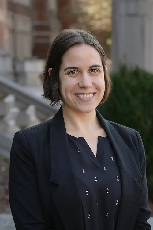 Professional Headshot of Annie Brown with Ayres Hall in the background