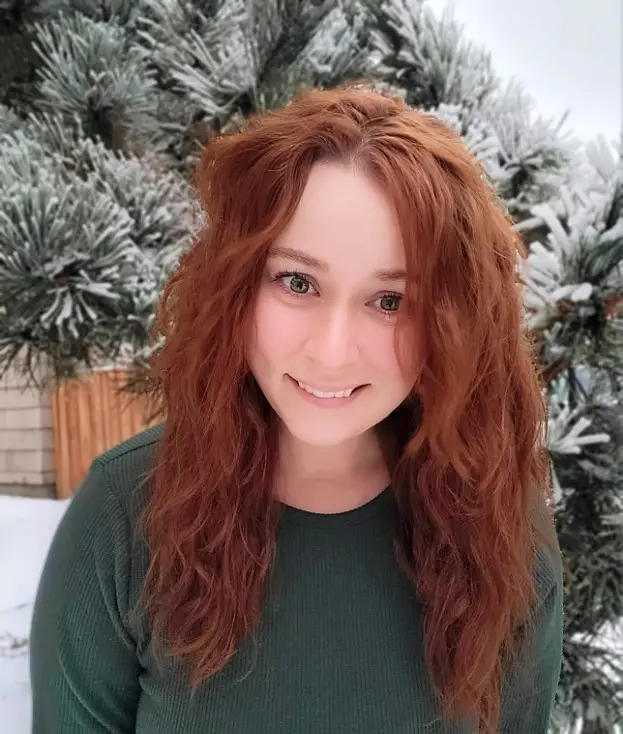 Headshot photo outdoors in winter with snow on the ground