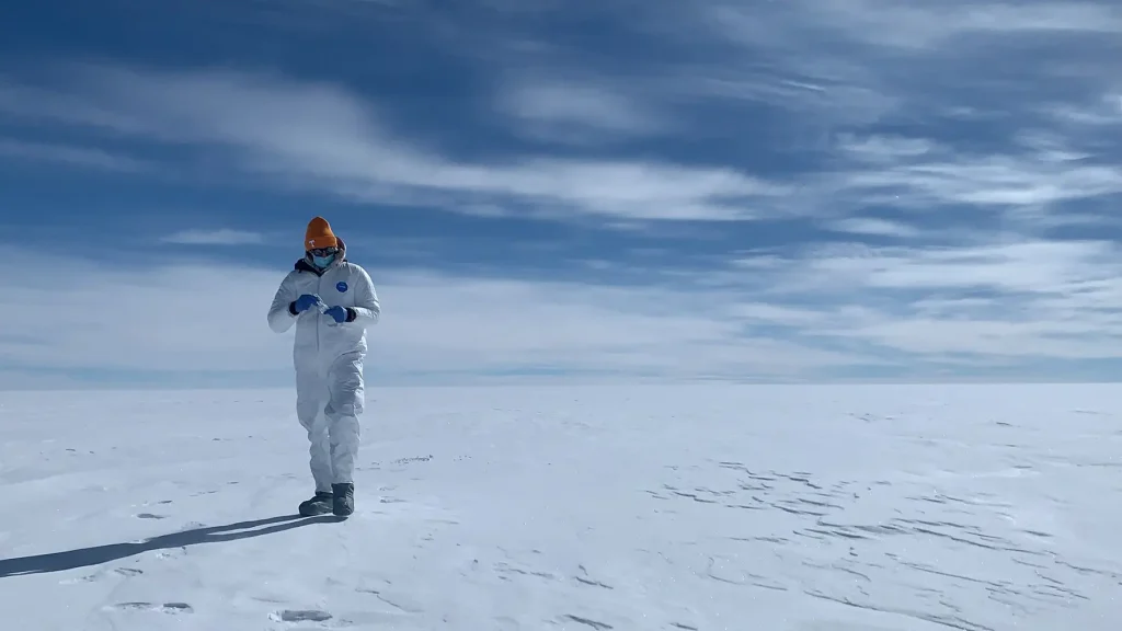 A researcher in the snow