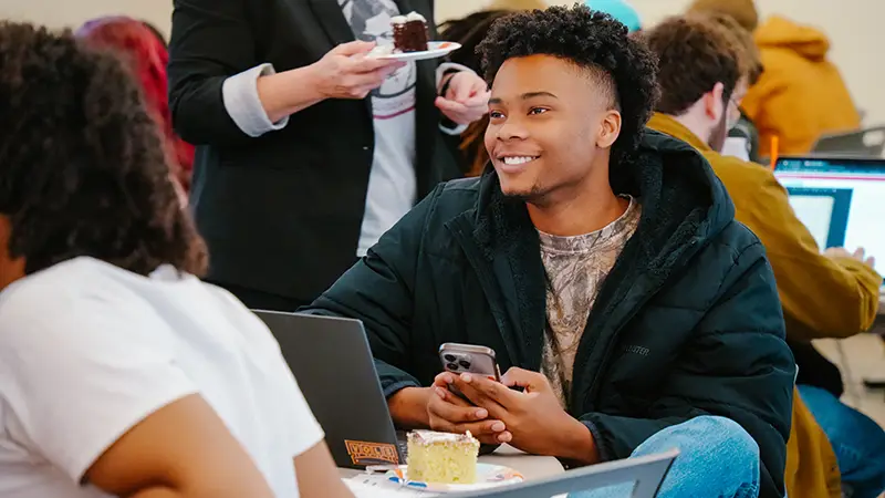 Students talking at the event