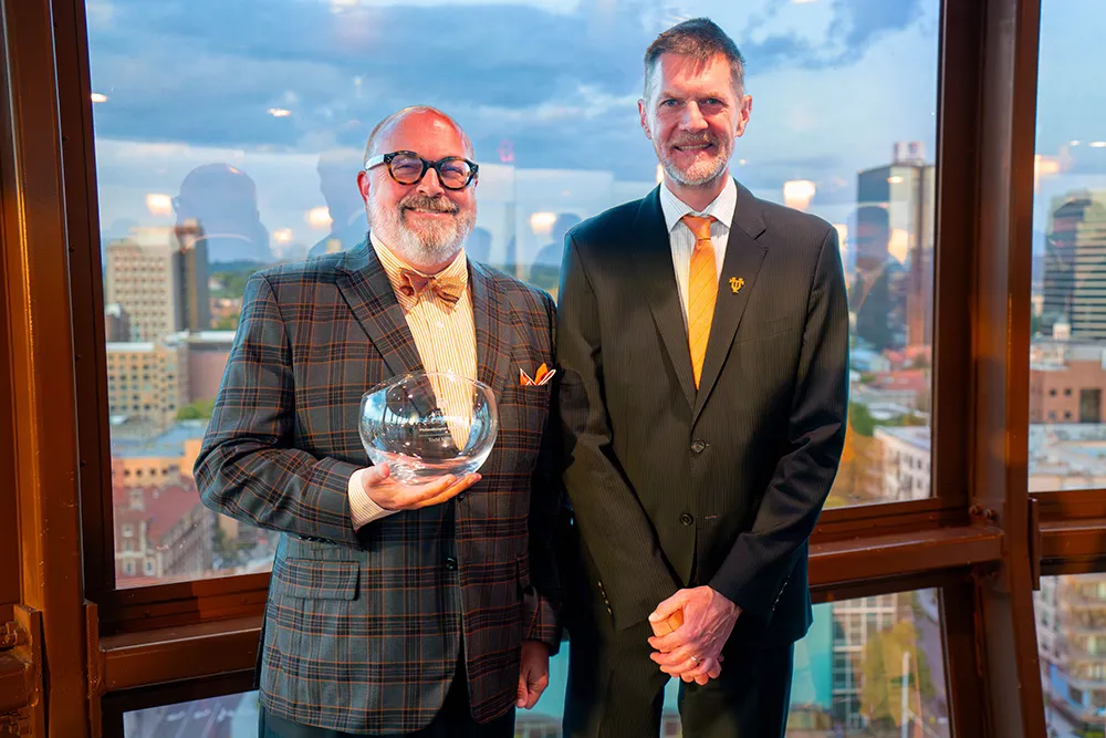 Winner of the Philanthropist of the Year Award, Todd Metcalf, poses with Dean of the College of Arts and Sciences, Robert Hinde 