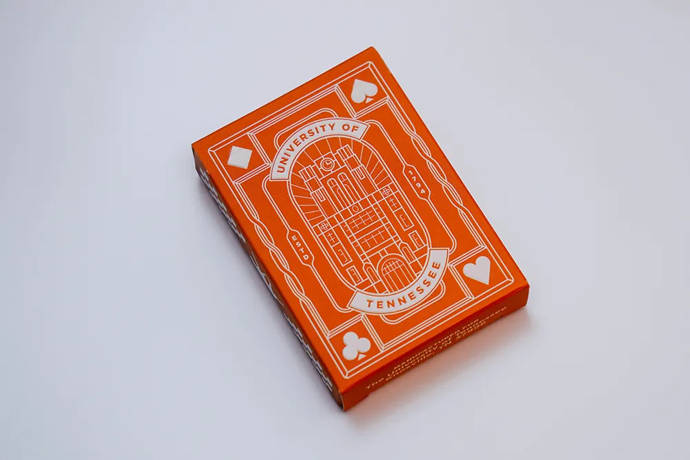 An exclusive UT orange playing card deck against a white background. 