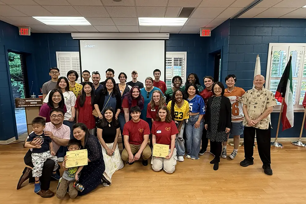 UT faculty and student members of the Chinese Culture Club celebrate their annual China Day event. 