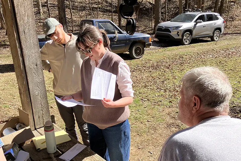 Students from AJRC meet with community members. 