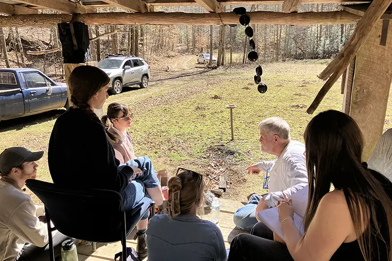 The interdisciplinary Appalachian Justice Research Center team consults with a landowner.