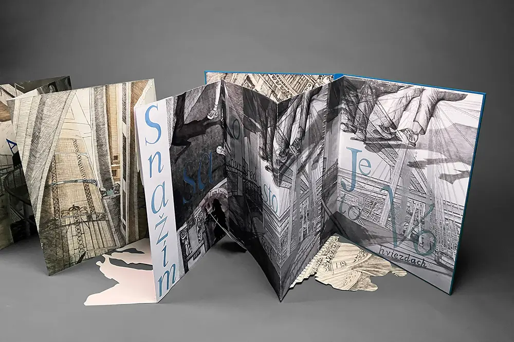 A snapshot of Tatiana Potts's accordion artist book titled, "Je to vo hviezdach (It's in the stars)."