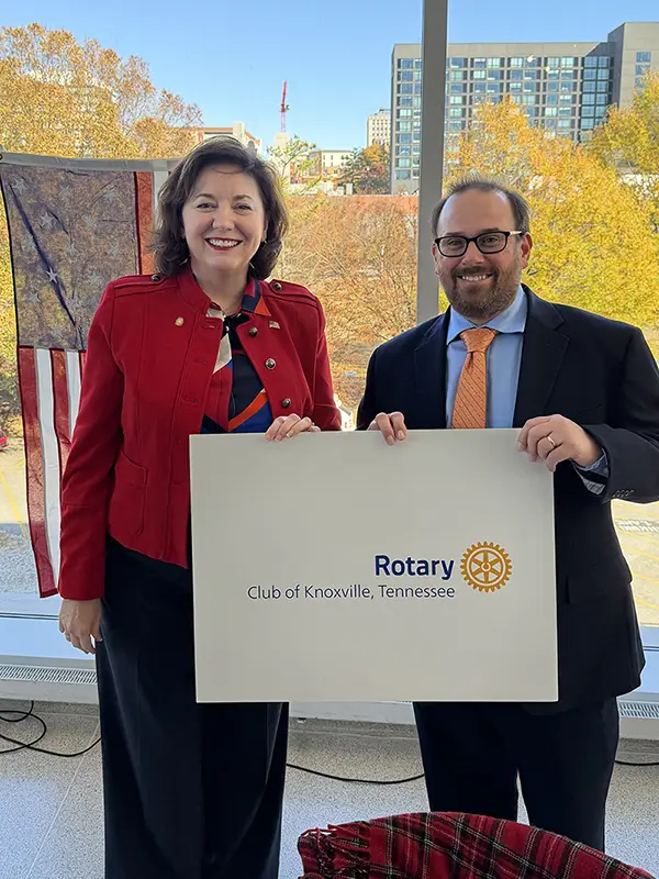 Associate Professor Matt Buehler, at right, with Shannon Holland, president of the Downtown Rotary Club of Knoxville.