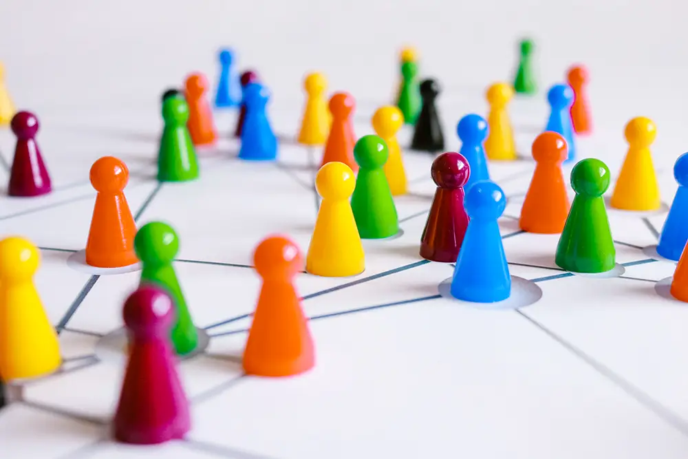 Pins lay across a map of interconnected lines.