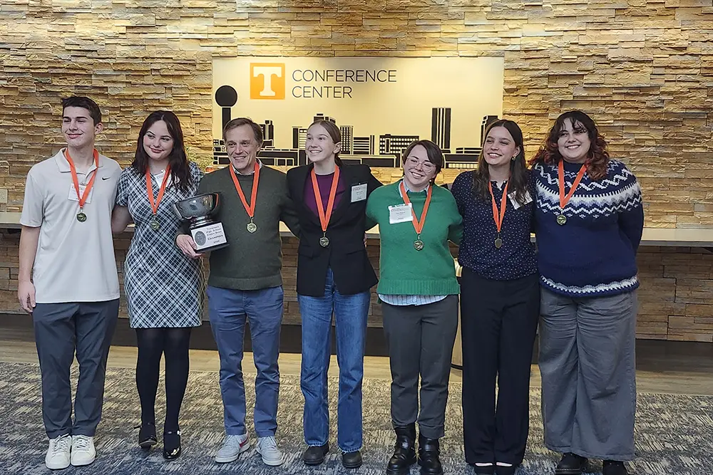 A team of high school students from the University School of Nashville stand together as winner s of the 2026 High School Ethics Bowl. 